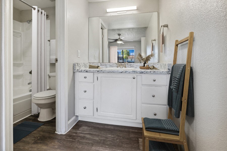 a bathroom with a toilet and a sink